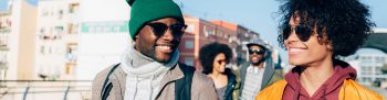 Couple taking a walk on a sunny day. Learn more about quitting tobacco.