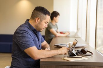 A man looking up online resources to quit tobacco.
