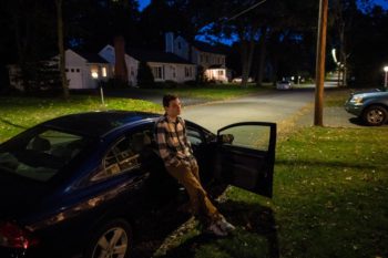 Teen looking concerned after getting addicted to vaping. Learn more about vaping and the risks.