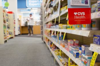 The aisle of a CVS pharmacy is shown. Learn more about vaping and tobacco use in Colorado.