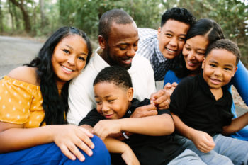 A family gathers for a photo. Learn more about vaping and tobacco use in Colorado.