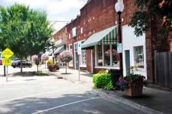 A downtown area is shown midday. Learn more about vaping and tobacco use in Colorado.