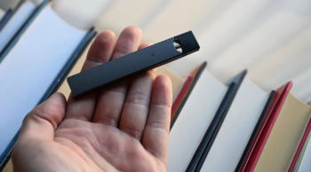 A JUUL vaping device is shown. Learn more about vaping and tobacco use in Colorado.