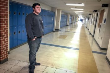 A teen who struggled with vape use is shown in a school hallway. Learn more about vaping and tobacco prevention in Colorado.
