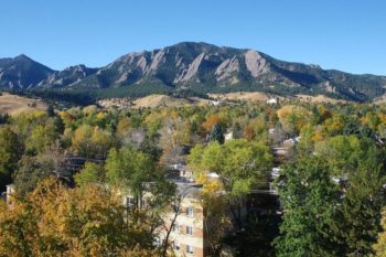 Boulder, Colorado is shown from above. Boulder passed a bill prohibiting tobacco sales to anyone under the age of 21. Learn more about vaping and tobacco prevention in Colorado.